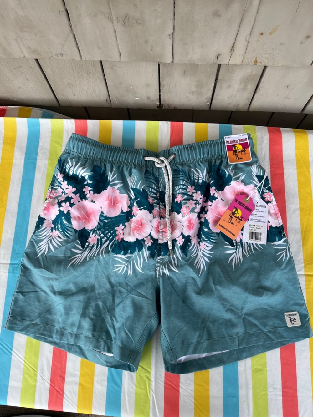 Endless Summer Men's Teal Floral Volley SwimShorts with Pink Hibiscus Print